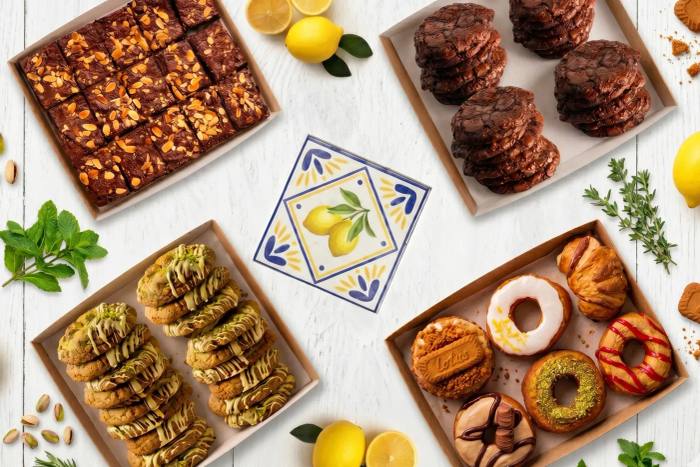 Trays of brownies, cookies and doughnuts